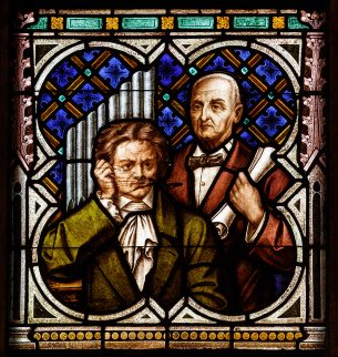 Colorful church window showing two musicians