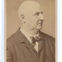 HIstorical photo of elderly Anton Bruckner in profile looking to the right